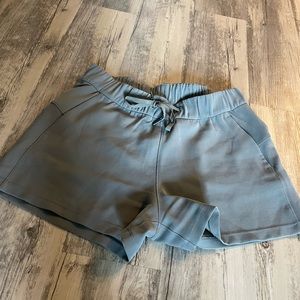 Lululemon size 6 on the fly short in green/gray.